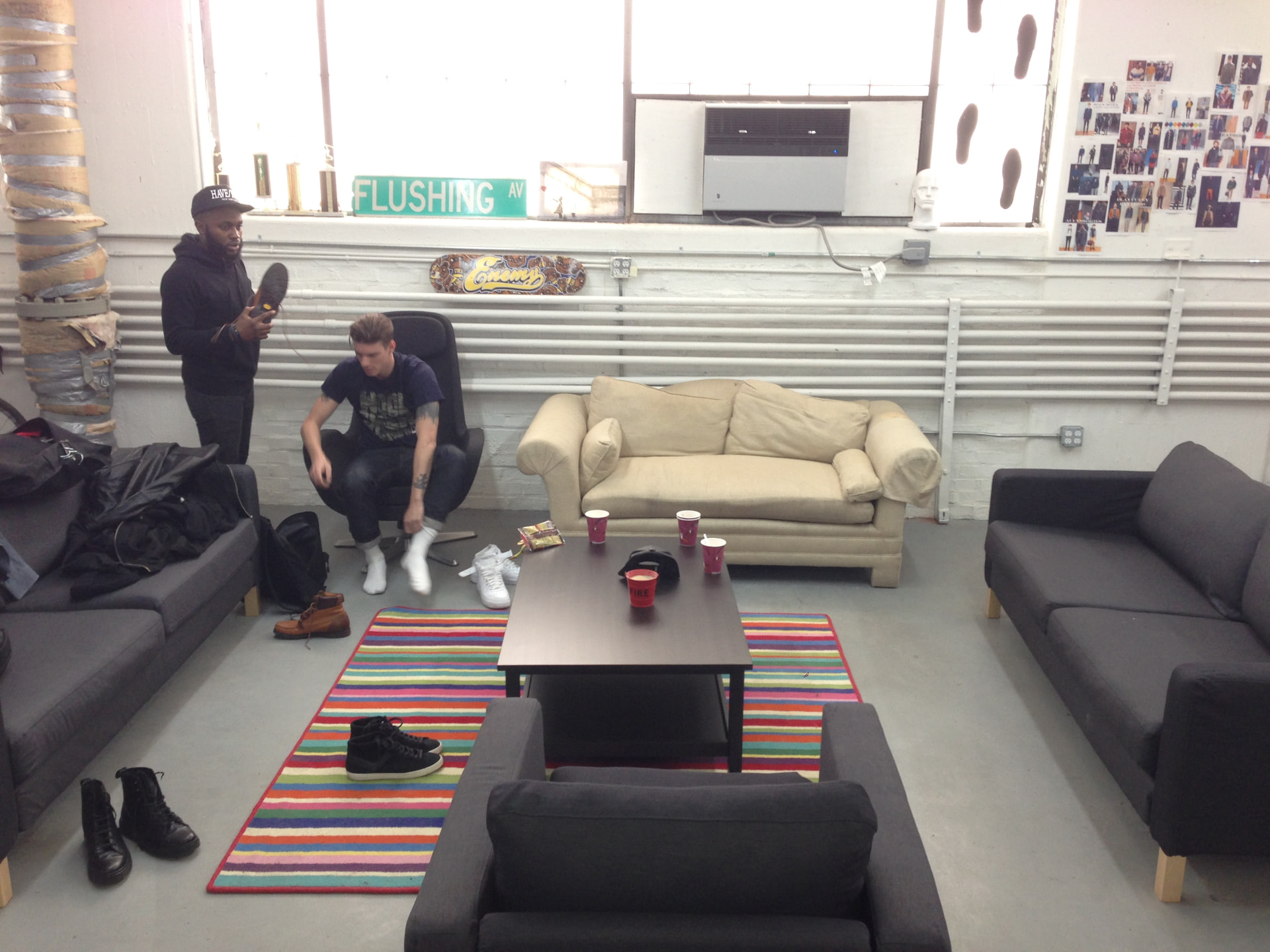 Team members styling product in the studio lounge